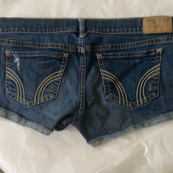 HOLLISTER JEAN DISTRESSED JEAN SHORT SHORT 1/2 HEM - Picture 5 of 10